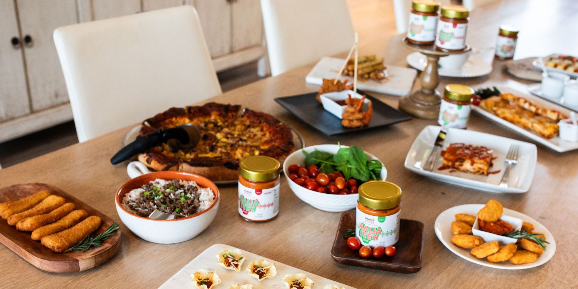 spread of dishes that pair well with Naija Sauce